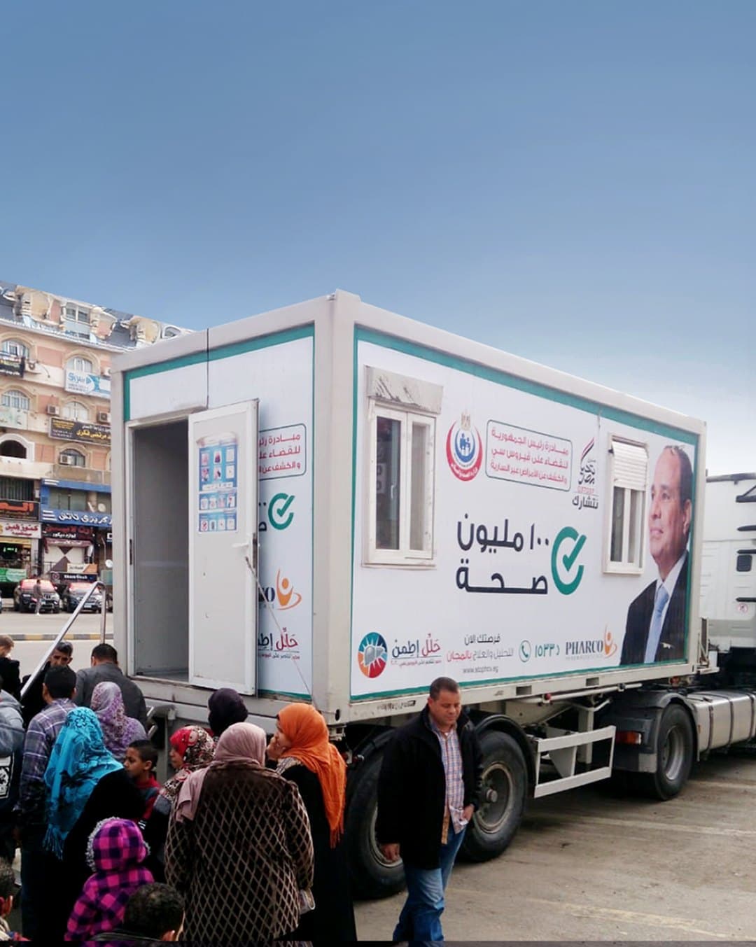 Patients gathered at a mobile Hepatitis C screening unit